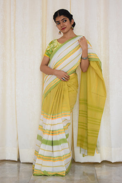 Namasya: Pale yellow, white & green Dhaniakhali saree