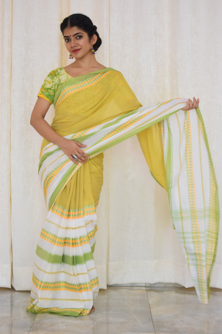 Namasya: Pale yellow, white & green Dhaniakhali saree