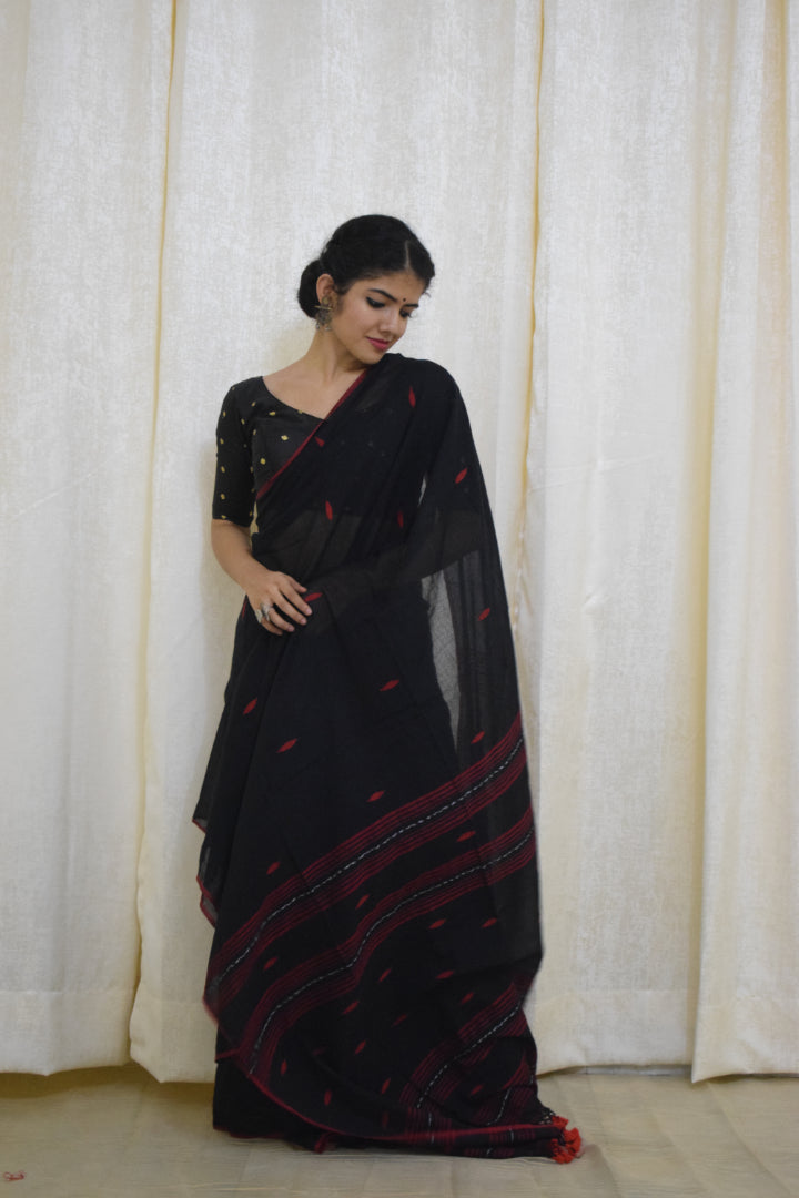 Sharvari: Black Mulmul Buti saree