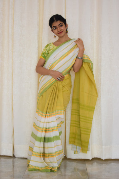 Namasya: Pale yellow, white & green Dhaniakhali saree