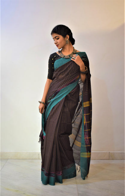 Dhāritri- Earthy Brown Cotton Ikat Saree