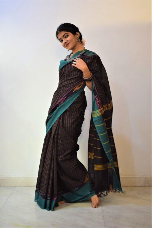 Dhāritri- Earthy Brown Cotton Ikat Saree