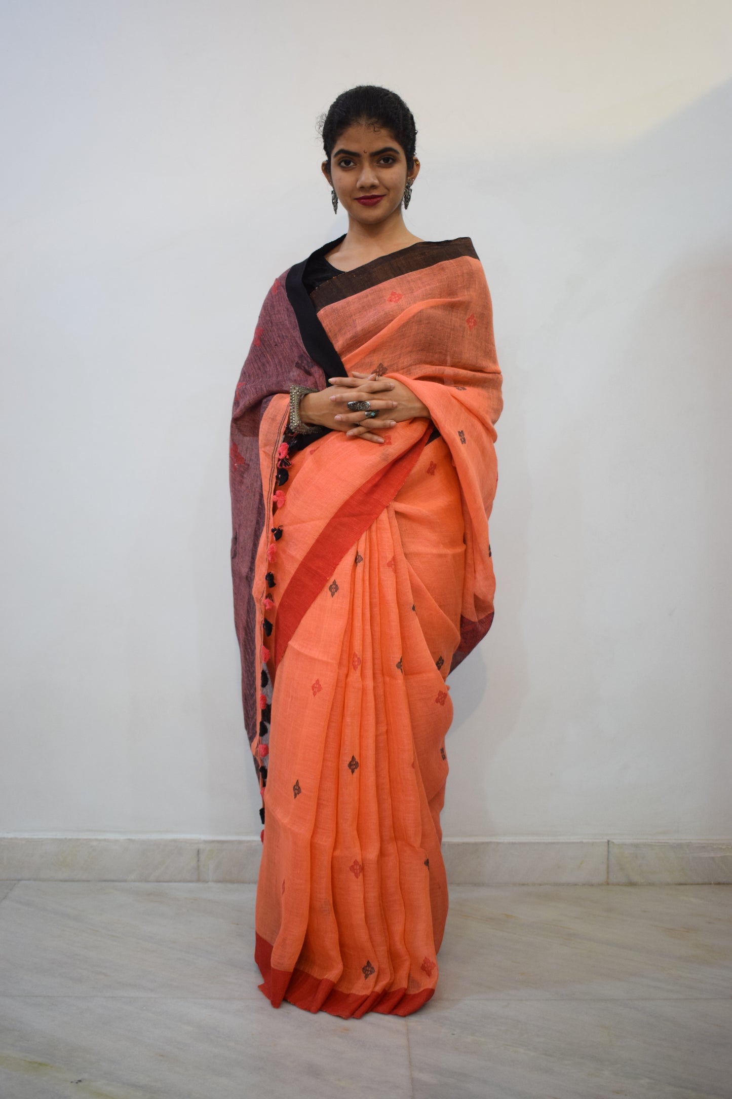 Vasudhākumāri- Peach & Rust Linen Jamdani Saree