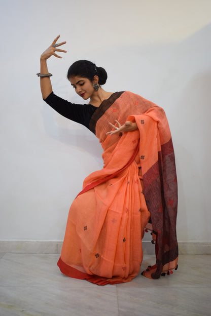 Vasudhākumāri- Peach & Rust Linen Jamdani Saree