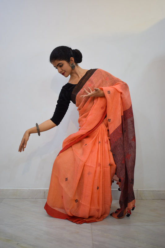 Vasudhākumāri- Peach & Rust Linen Jamdani Saree