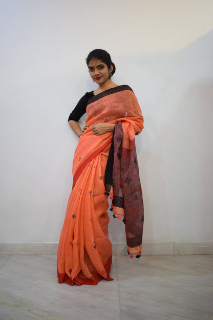 Vasudhākumāri- Peach & Rust Linen Jamdani Saree