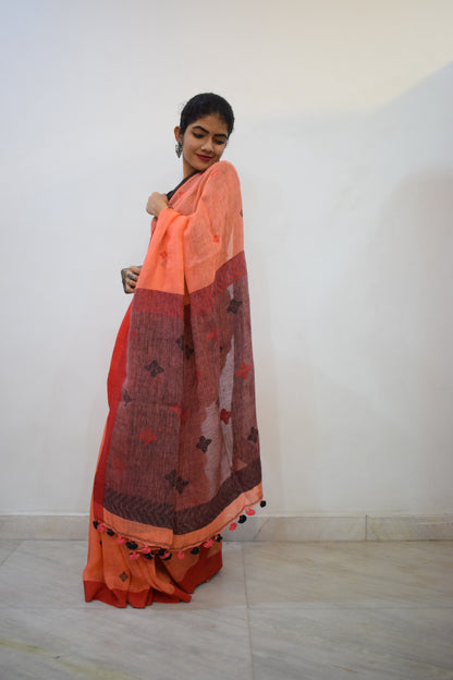 Vasudhākumāri- Peach & Rust Linen Jamdani Saree